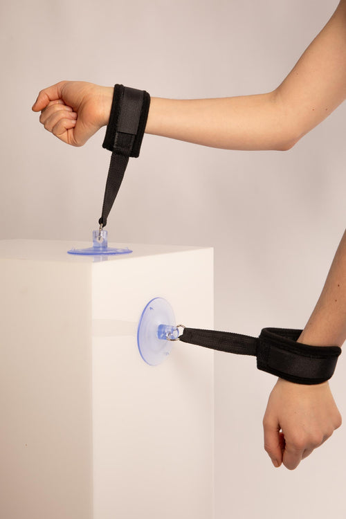 ADJUSTABLE HANDCUFFS WITH BLACK SUCTION CUPS