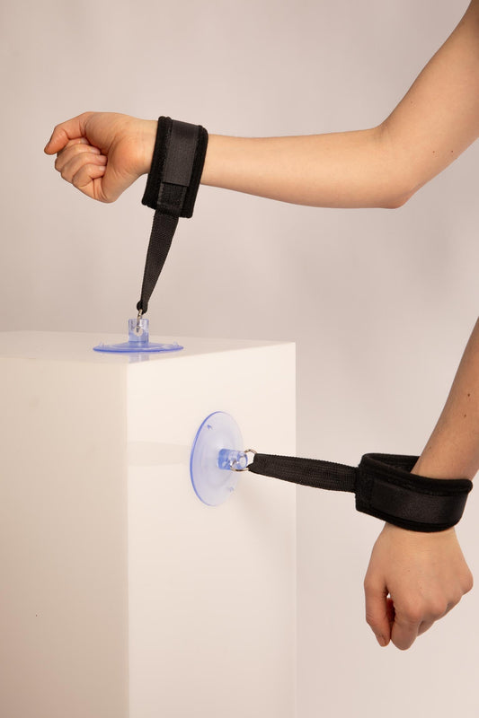 ADJUSTABLE HANDCUFFS WITH BLACK SUCTION CUPS